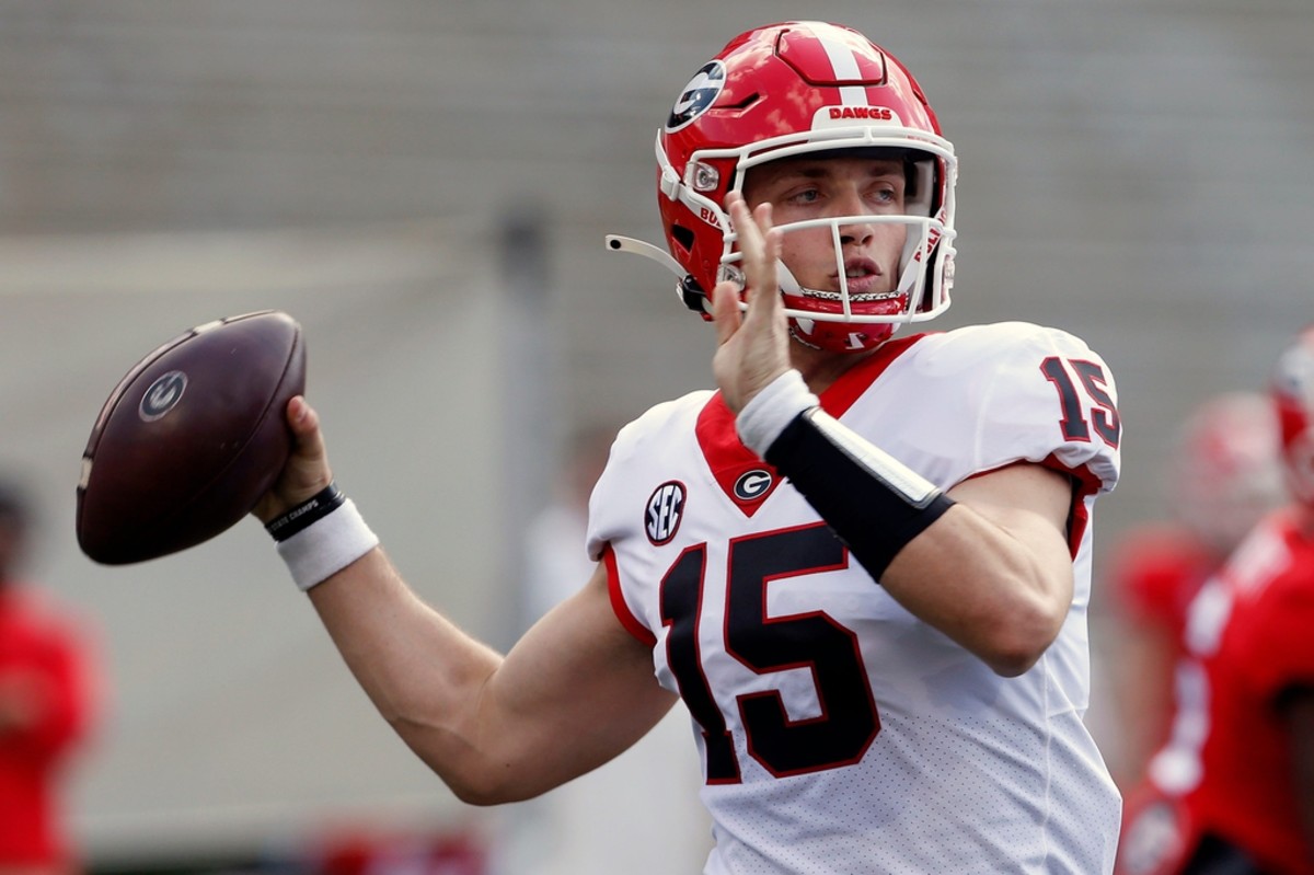 Georgia quarterback Carson Beck (15) throws the ball during the UGA G-Day spring football game at Sanford Stadium in Athens on Saturday.