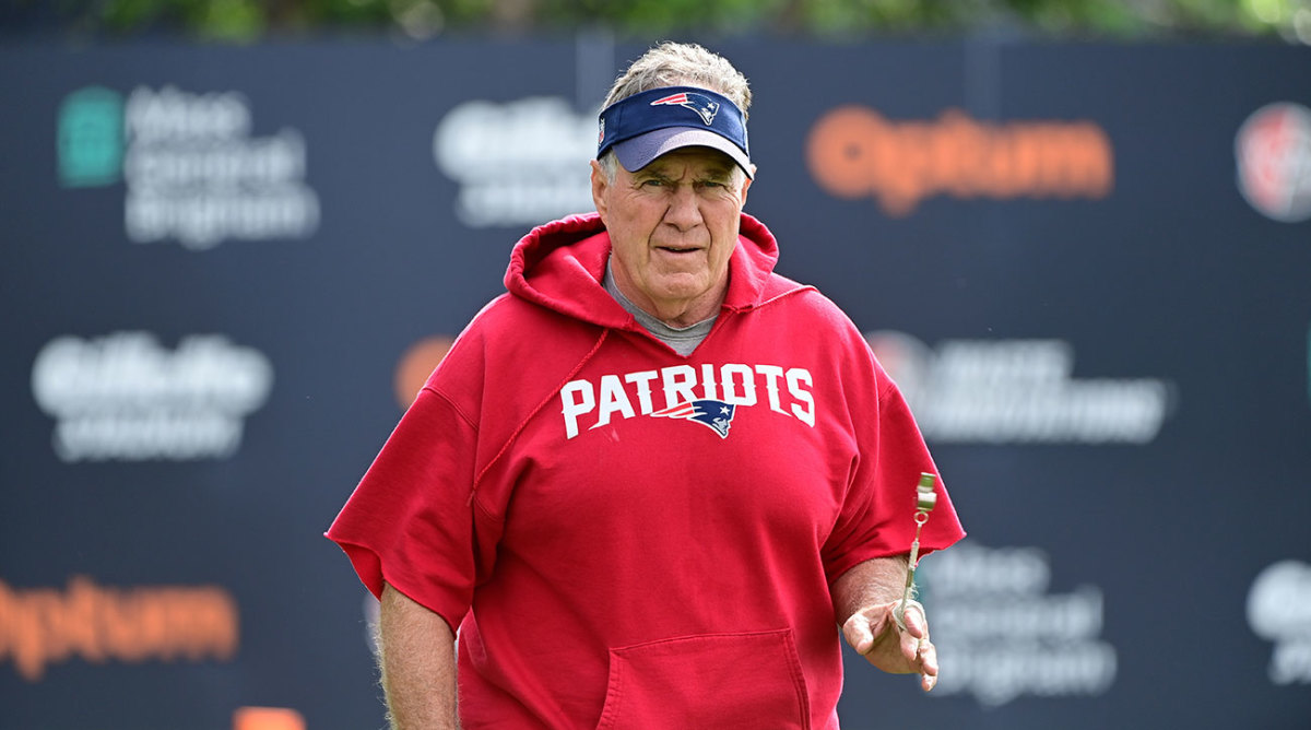 Bill Belichick wearing a cut-up sweatshirt at Patriots training camp