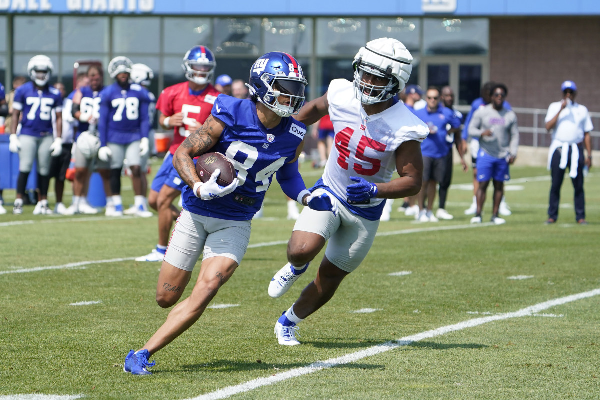New York Giants WR Jalin Hyatt running away from a defender during training camp in East Rutherford, New Jersey, on July 26, 2023. (Photo by Danielle Parhizkaran of USA Today Sports)
