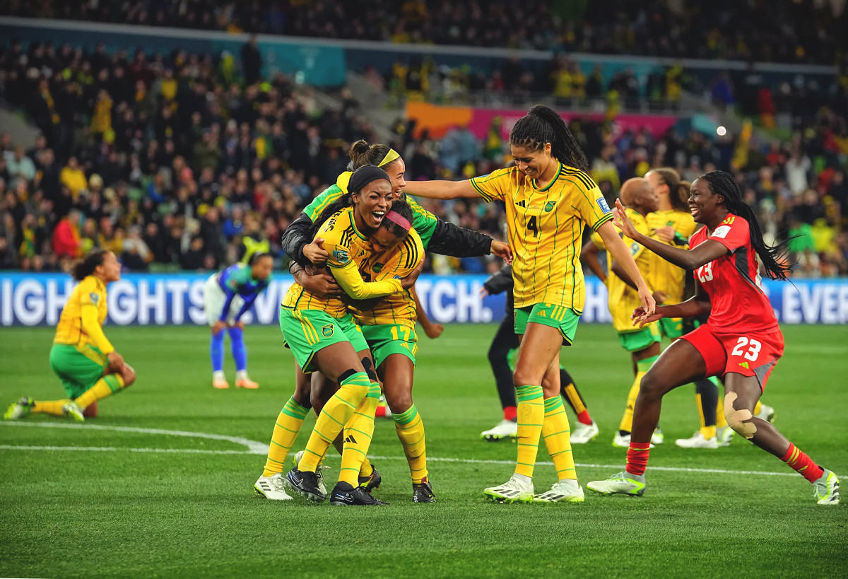 Jamaica's women's national team celebrates after clinching a spot in the round of 16 at the Women's World Cup.
