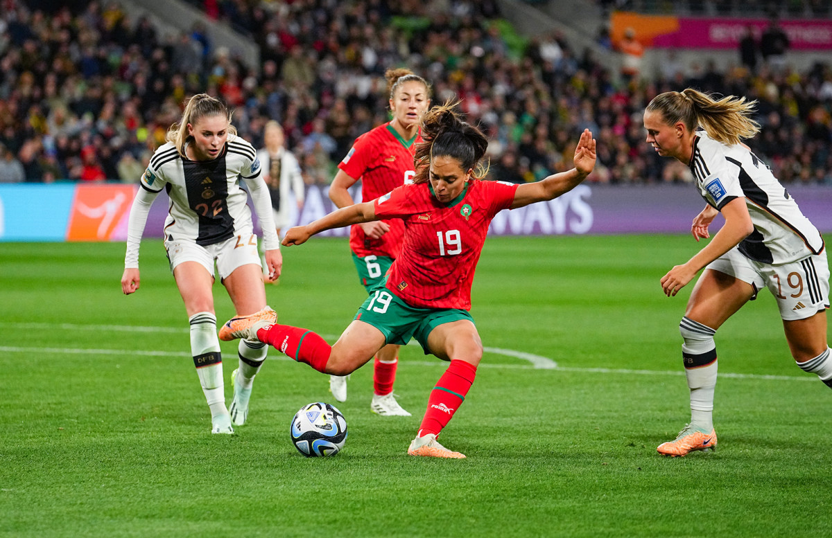 Sakina Ouzraoui of Morocco passes the ball while playing Germany at the Women's World Cup.
