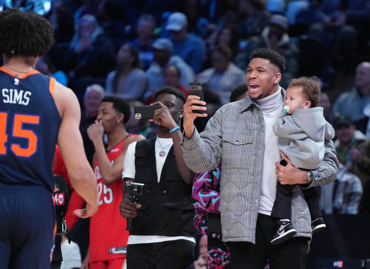 Milwaukee Bucks forward Giannis Antetokounmpo reacts after a dunk by New York Knicks center Jericho Sims (45) in the Dunk Contest during the 2023 All Star Saturday Night