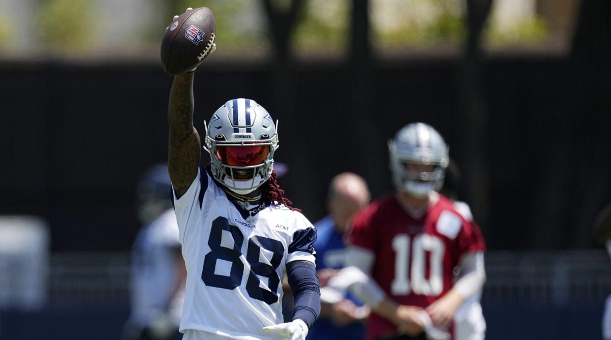 Cowboys wide receiver CeeDee Lamb celebrates a play at training camp.