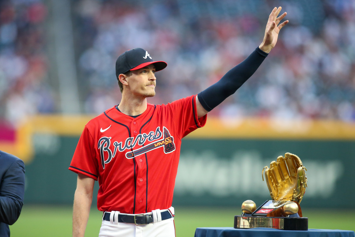Apr 7, 2023; Atlanta, Georgia, USA; Atlanta Braves starting pitcher Max Fried (54) receives a gold glove before a game against the San Diego Padres at Truist Park.