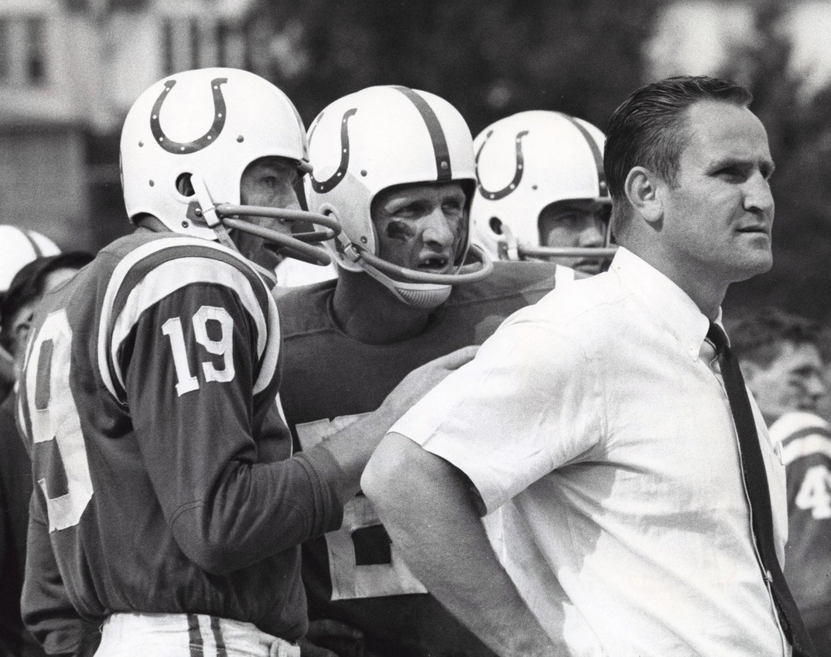 Baltimore Colts head coach Don Shula on the sideline with Johnny Unitas (19) and Ray Perkins (27) against the San Francisco 49ers at Memorial Stadium.