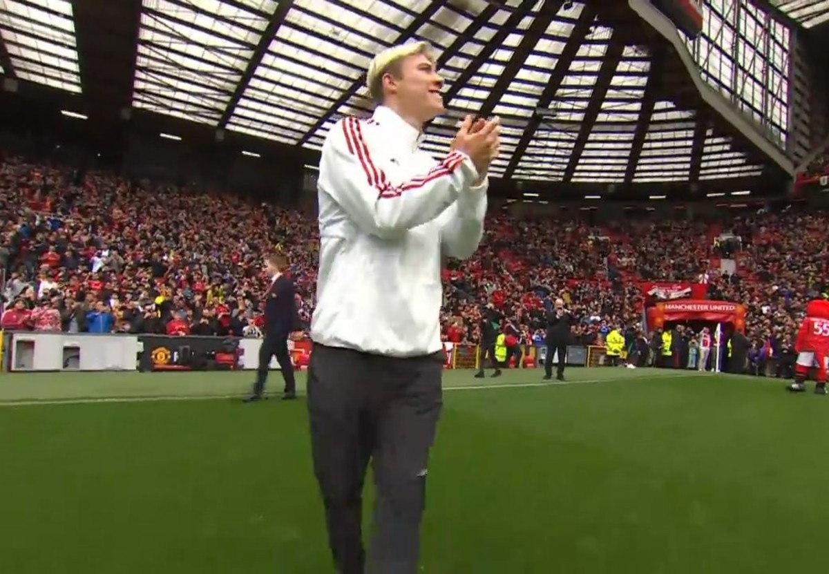Rasmus Hojlund pictured applauding Manchester United fans at Old Trafford after completing a £72 million transfer from Atalanta in August 2023