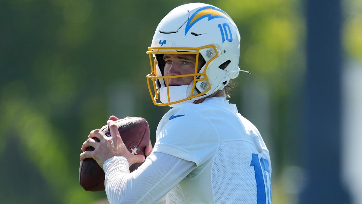 Chargers quarterback Justin Herbert throws during training camp