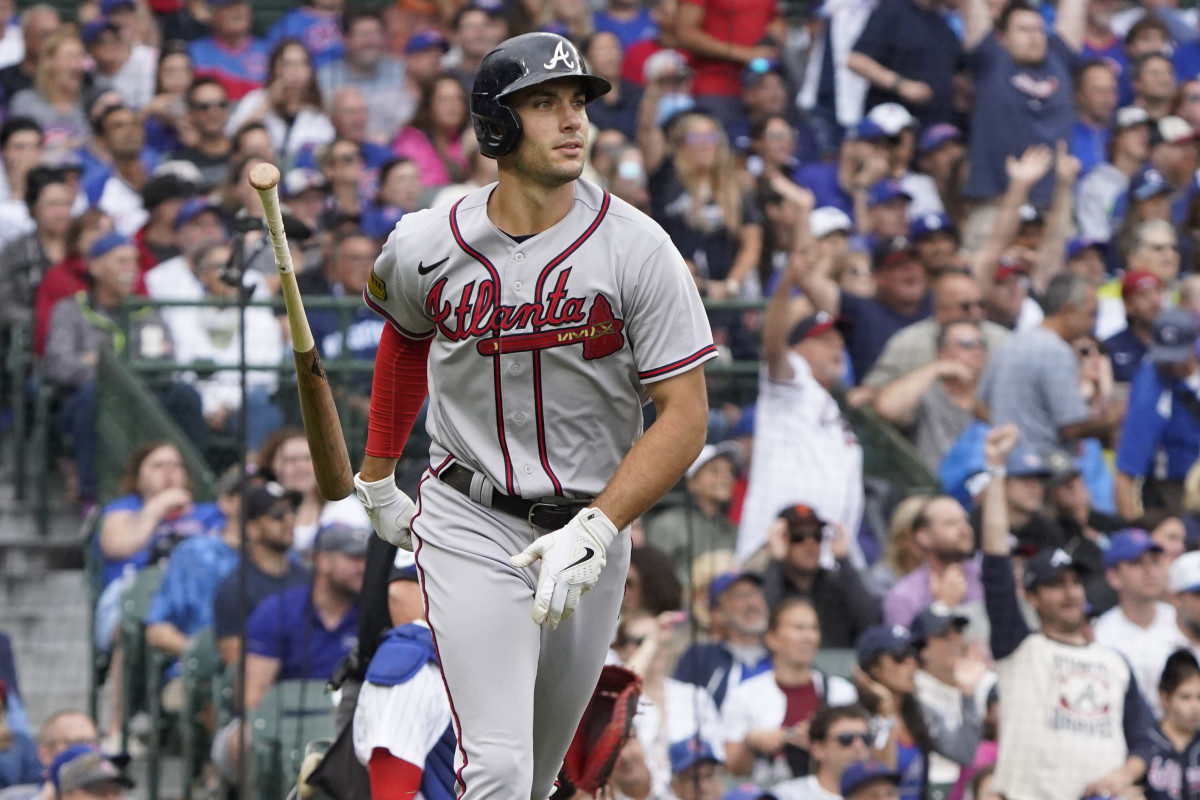Aug 6, 2023; Chicago, Illinois, USA; Atlanta Braves first baseman Matt Olson (28) hits a two-run home run against the Chicago Cubs during the third inning at Wrigley Field.