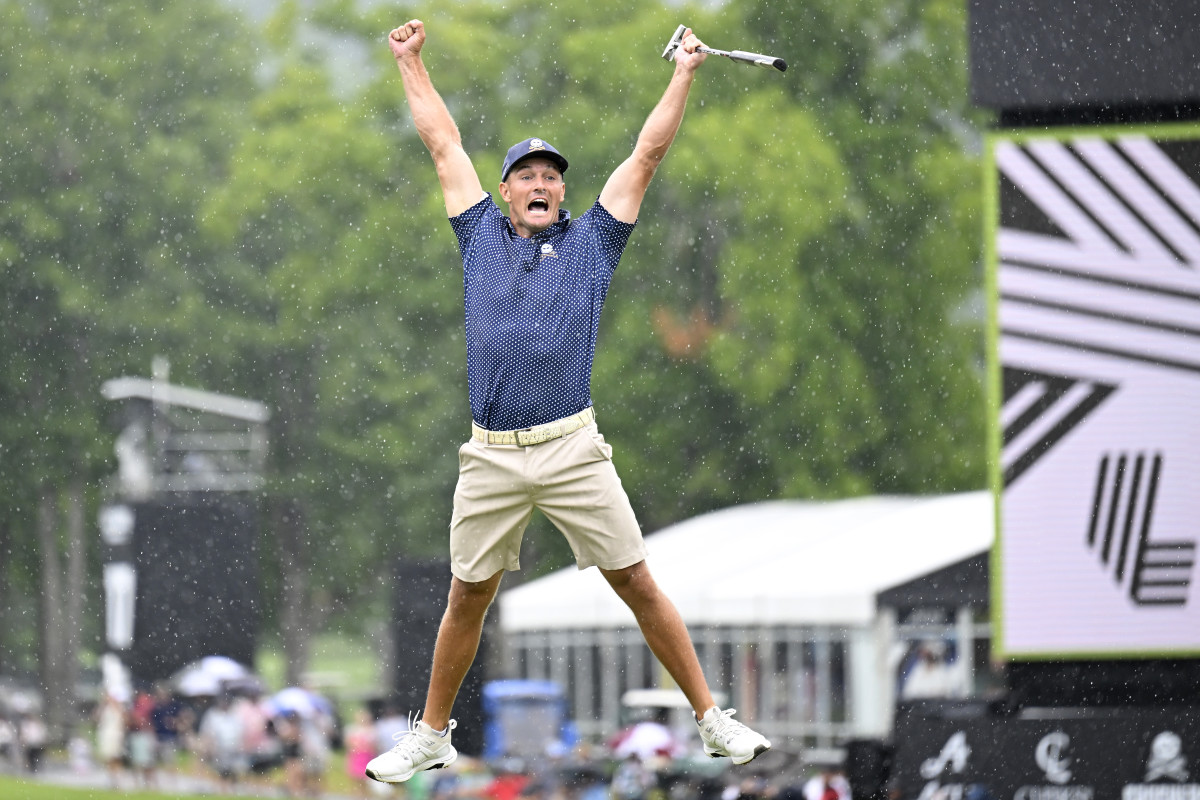 Bryson DeChambeau of the United States celebrates his birdie putt on the 18th hole with a record 58 to win the LIV Golf Invitational - Greenbrier at The Old White Course on August 06, 2023 in White Sulphur Springs, West Virginia.