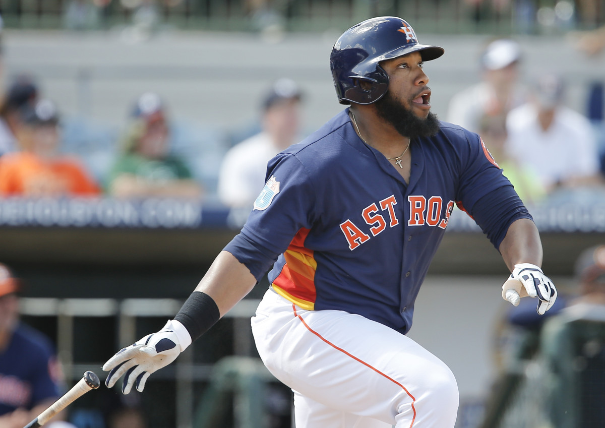 Mar 16, 2016; Kissimmee, FL, USA; Houston Astros designated hitter Jon Singleton (21) hits a two run double to right field during the sixth inning of a spring training baseball game against the Detroit Tigers at Osceola County Stadium. The Tigers won 7-3. Mandatory Credit: Reinhold Matay-USA TODAY Sports