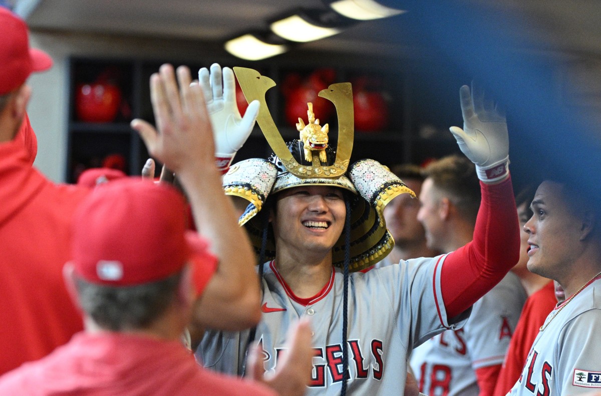 LA Angels designated hitter Shohei Ohtani (17) celebrates in the dugout after hitting a home run against the Milwaukee Brewers (2023)