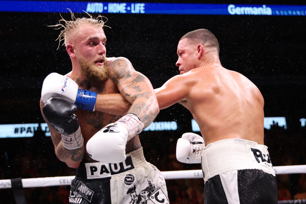 Jake Paul and former UFC title challenger Nate Diaz throw leather during their boxing match.