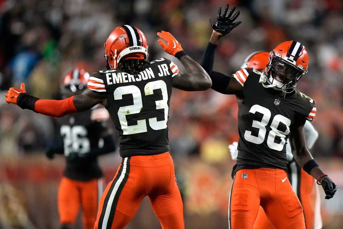 cornerback Martin Emerson Jr. highfives cornerback A.J. Green