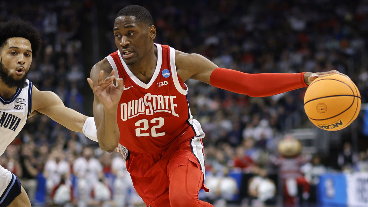 Ohio State Buckeyes guard Malaki Branham (22) dribbles the ball around Villanova Wildcats guard Caleb Daniels (14) in the first half during the second round of the 2022 NCAA Tournament.