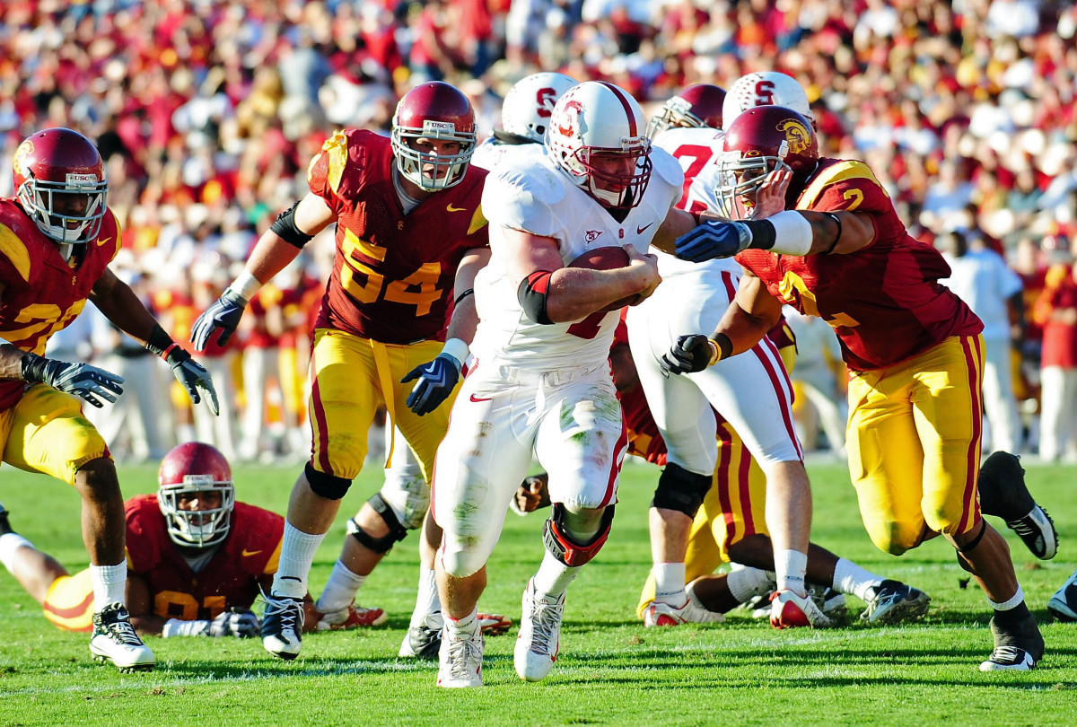Stanford Cardinal running back Toby Gerhart (7) runs the ball against the Southern California Trojans during the second half at the Los Angeles Memorial Coliseum. Stanford defeats Southern California 55-21