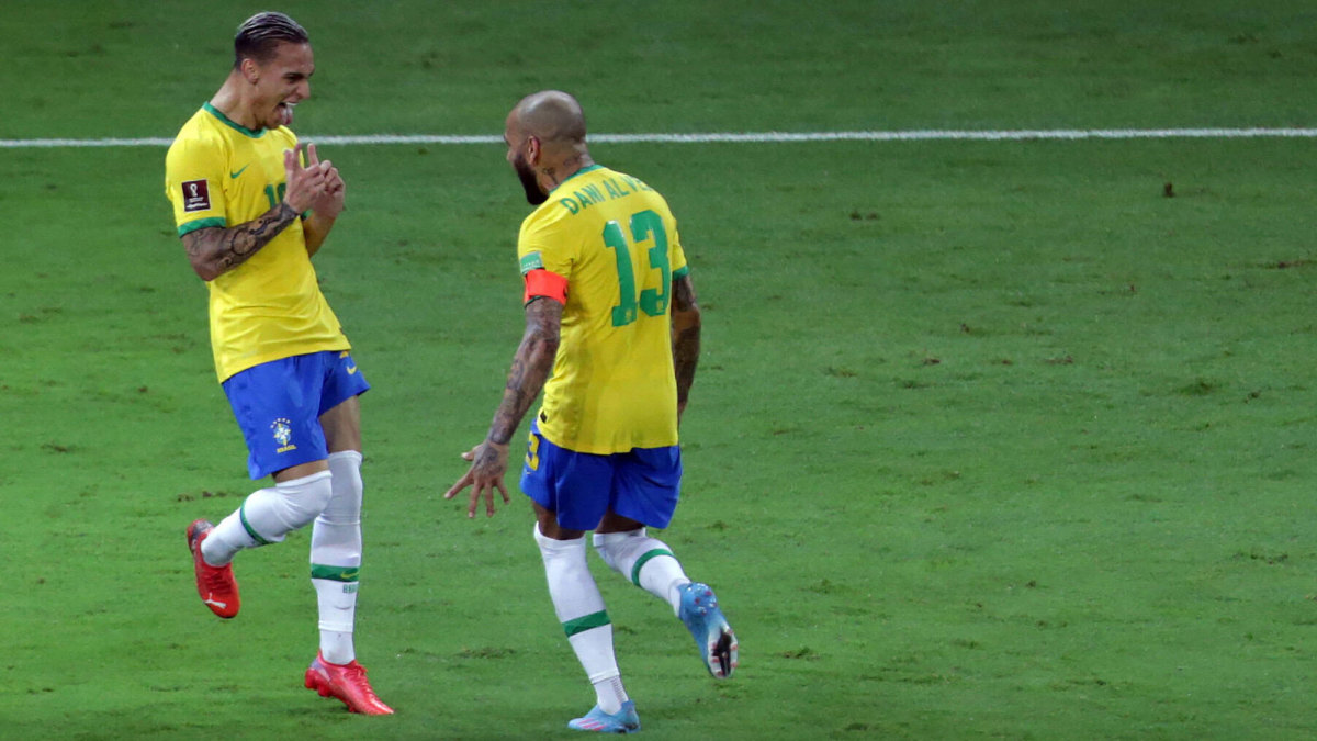Dani Alves and Antony celebrate a Brazil goal