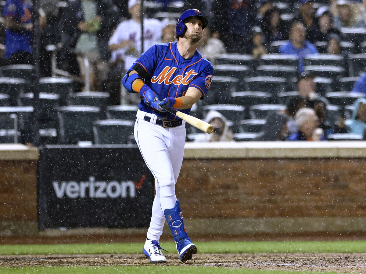 New York Mets’ Jeff McNeil watches his three-run home run against the Philadelphia Phillies during the fourth inning of a baseball game Saturday, May 28, 2022, in New York.