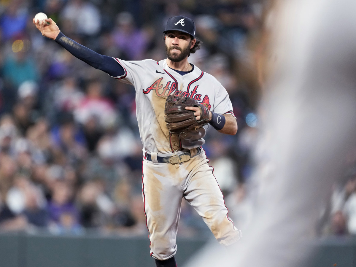 Atlanta Braves shortstop Dansby Swanson throws to first base to put out Colorado Rockies’ Connor Joe during the sixth inning of a baseball game Friday, June 3, 2022, in Denver.