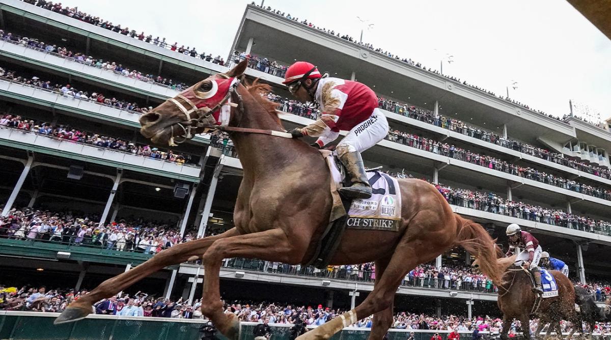 Rich Strike, with Sonny Leon up, runs down the field to win the 148th running of the Kentucky Derby on Saturday, May 7, 2022.