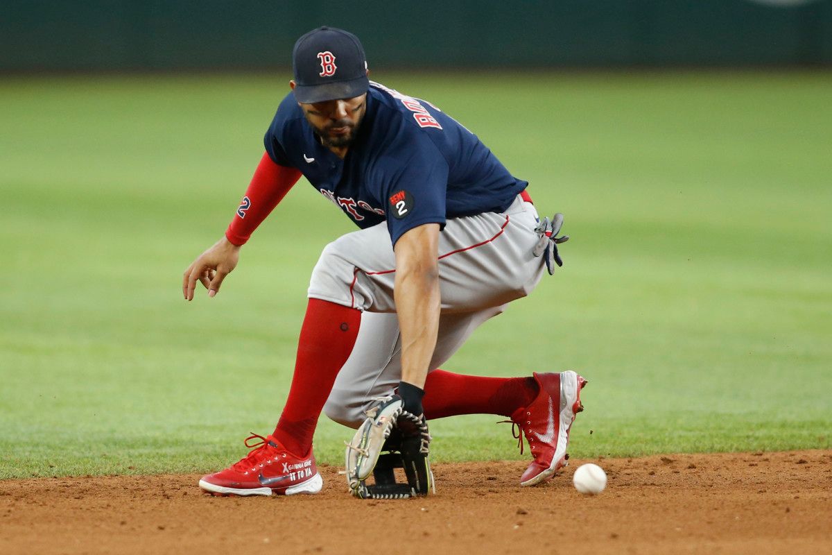 Bogaerts fields a ground ball in the fifth inning against the Texas Rangers at Globe Life Field.