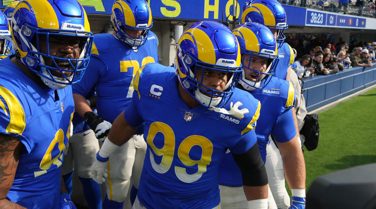 Aaron Donald and teammates prepare to run onto the field.