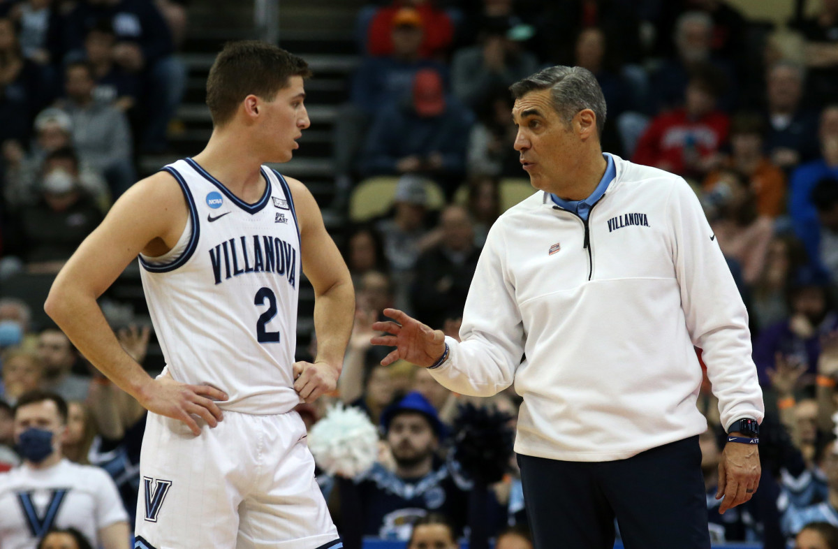 Villanova Wildcats head coach Jay Wright talks with guard Collin Gillespie (2) in the first half during the second round of the 2022 NCAA Tournament at PPG Paints Arena.