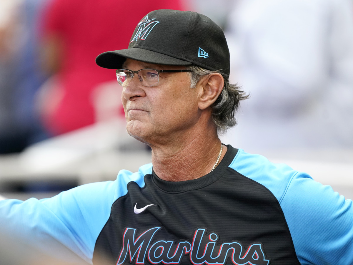 Miami Marlins manager Don Mattingly looks out from the dugout before a baseball game against Atlanta Braves, Friday, May 27, 2022, in Atlanta, Ga.