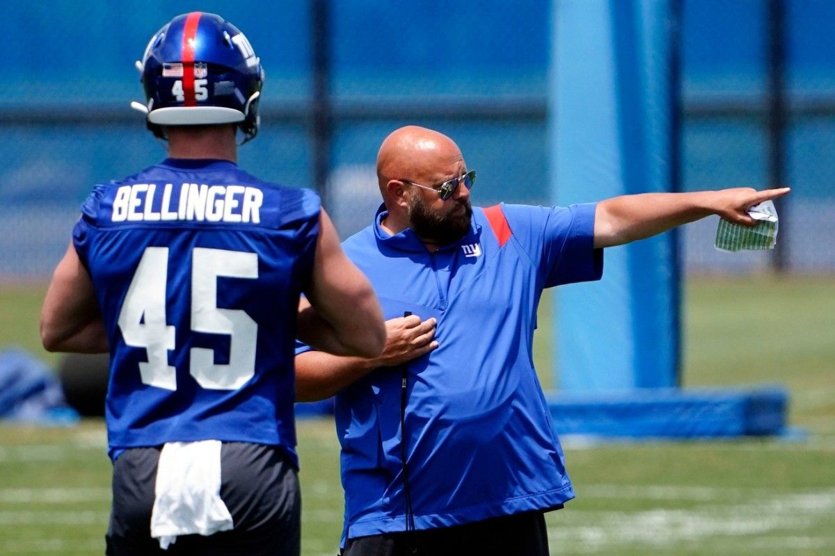 New York Giants rookie tight end Daniel Bellinger (45) and head coach Brian Daboll seen during mandatory minicamp at the Quest Diagnostics Training Center on Tuesday, June 7, 2022, in East Rutherford.