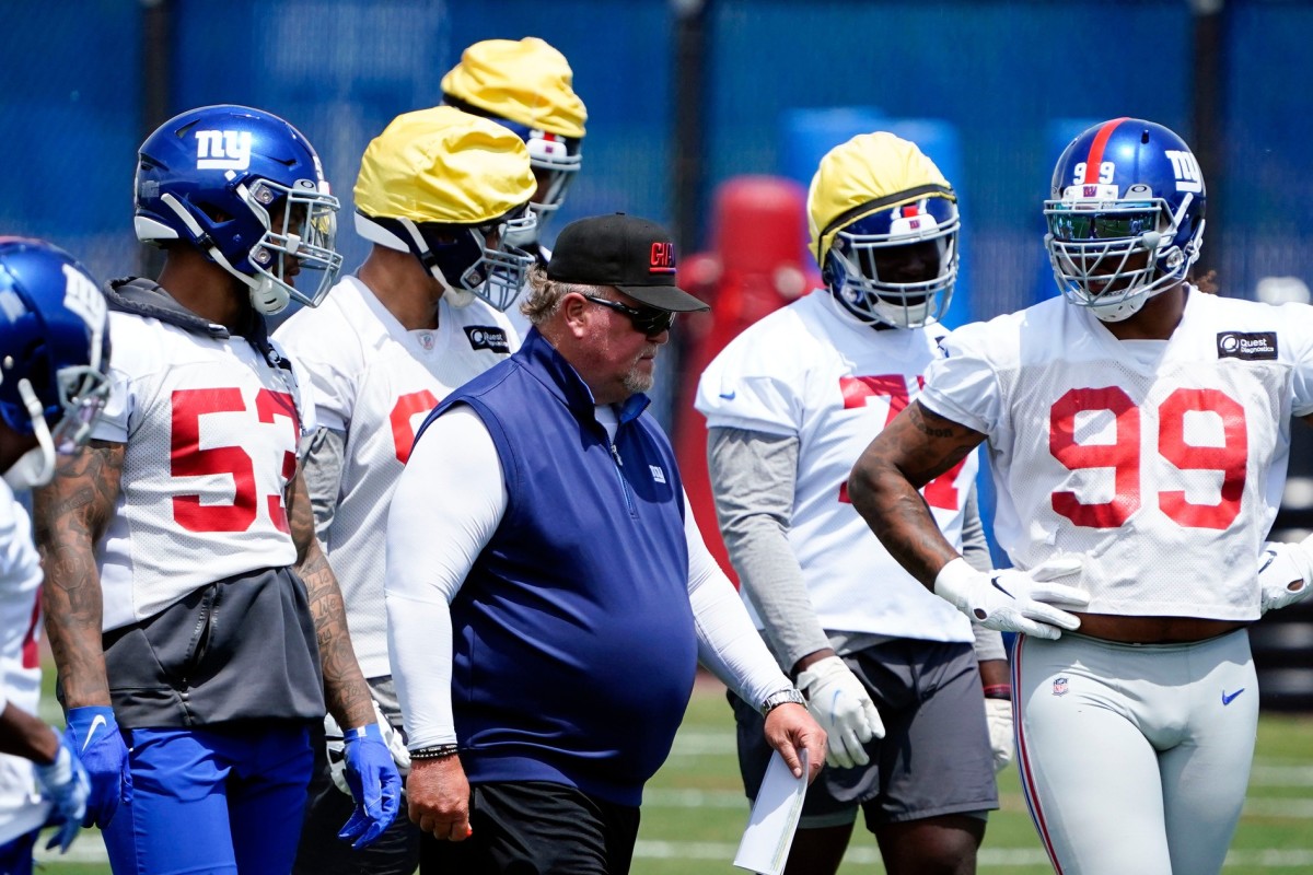 New York Giants defensive coordinator Don \"Wink\" Martindale walks on the field with the defense during mandatory minicamp at the Quest Diagnostics Training Center on Tuesday, June 7, 2022, in East Rutherford.