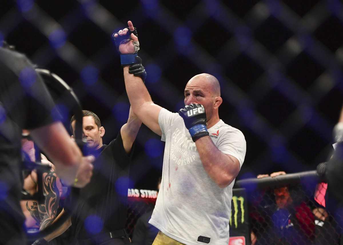 Glover Teixeira (blue gloves) celebrates after defeating Anthony Smith (red gloves) during UFC Fight Night at VyStar Veterans Memorial Arena.