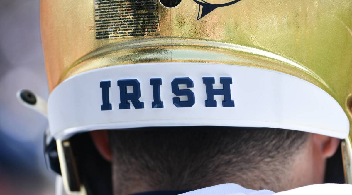 The back of a Notre Dame Football helmet with the word "Irish" written.