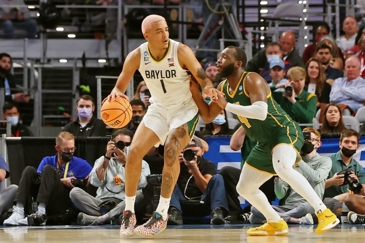 Mar 17, 2022; Fort Worth, TX, USA; Baylor Bears forward Jeremy Sochan (1) dribbles the ball against Norfolk State Spartans guard Joe Bryant Jr. (4) during the second half during the first round of the 2022 NCAA Tournament at Dickies Arena. Mandatory Credit: Kevin Jairaj-USA TODAY Sports