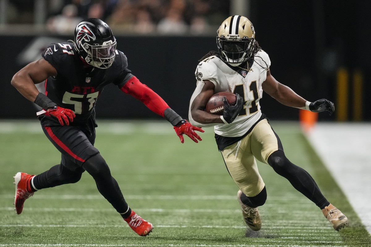 New Orleans Saints running back Alvin Kamara (41) runs past Atlanta Falcons linebacker Brandon Copeland (51). Mandatory Credit: Dale Zanine-USA TODAY Sports