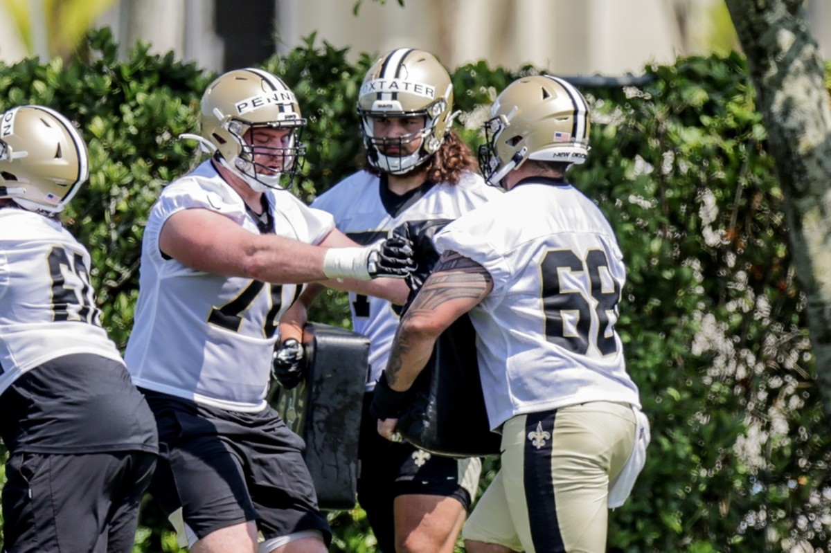 New Orleans Saints offensive tackle Trevor Penning (70), center Cohl Cabral (68) and offensive tackle Sage Doxtater (79) during rookie camp at the Saints Training Facility. Mandatory Credit: Stephen Lew-USA TODAY Sports