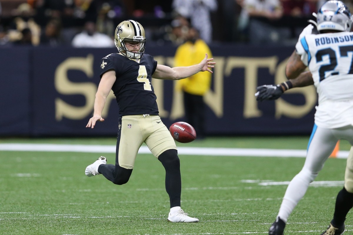 New Orleans Saints punter Blake Gillikin (4) punts against the Carolina Panthers at the Caesars Superdome. Mandatory Credit: Chuck Cook-USA TODAY