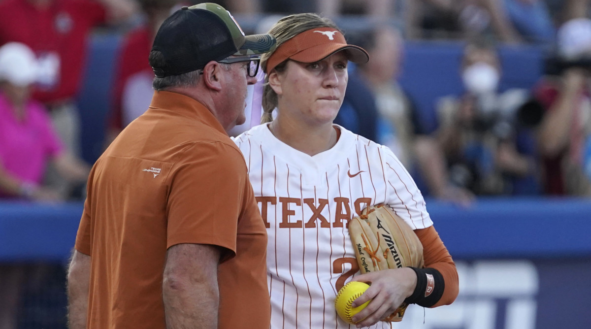 Texas pitcher Hailey Dolcini is pulled in the first inning of Game 1 in the Women’s College World Series