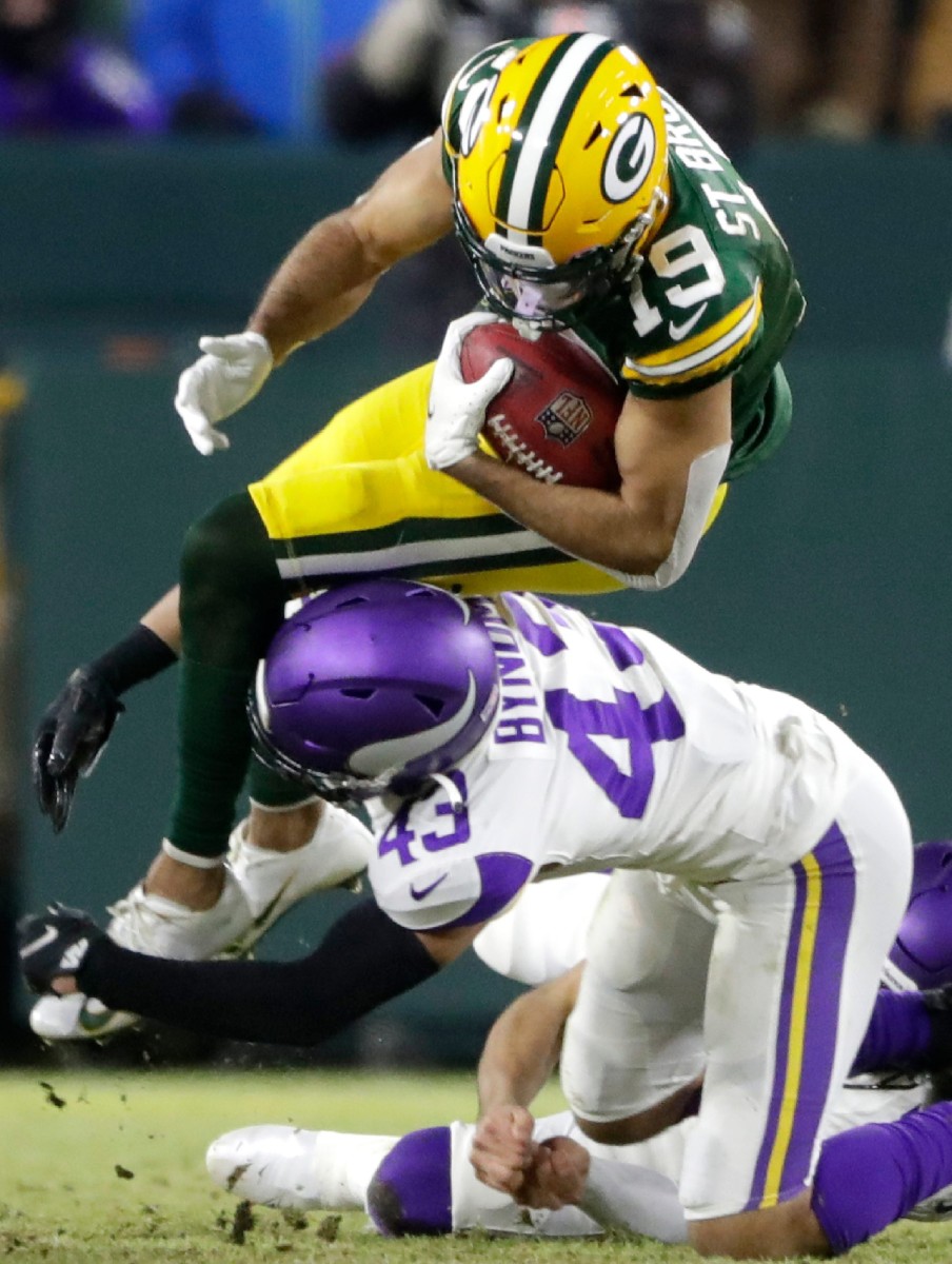 Cam Bynum makes a tackle vs. the Packers
