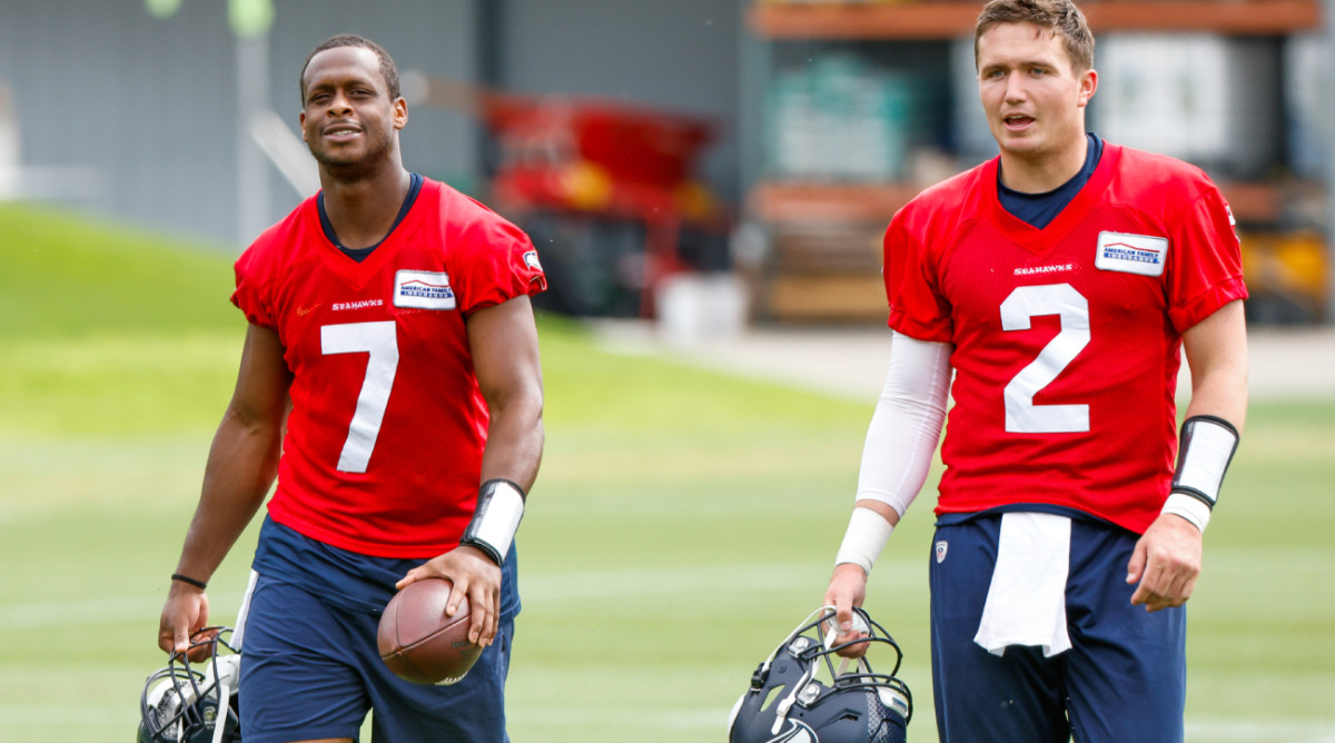 Seattle Seahawks quarterbacks Geno Smith (7) and Drew Lock (2)