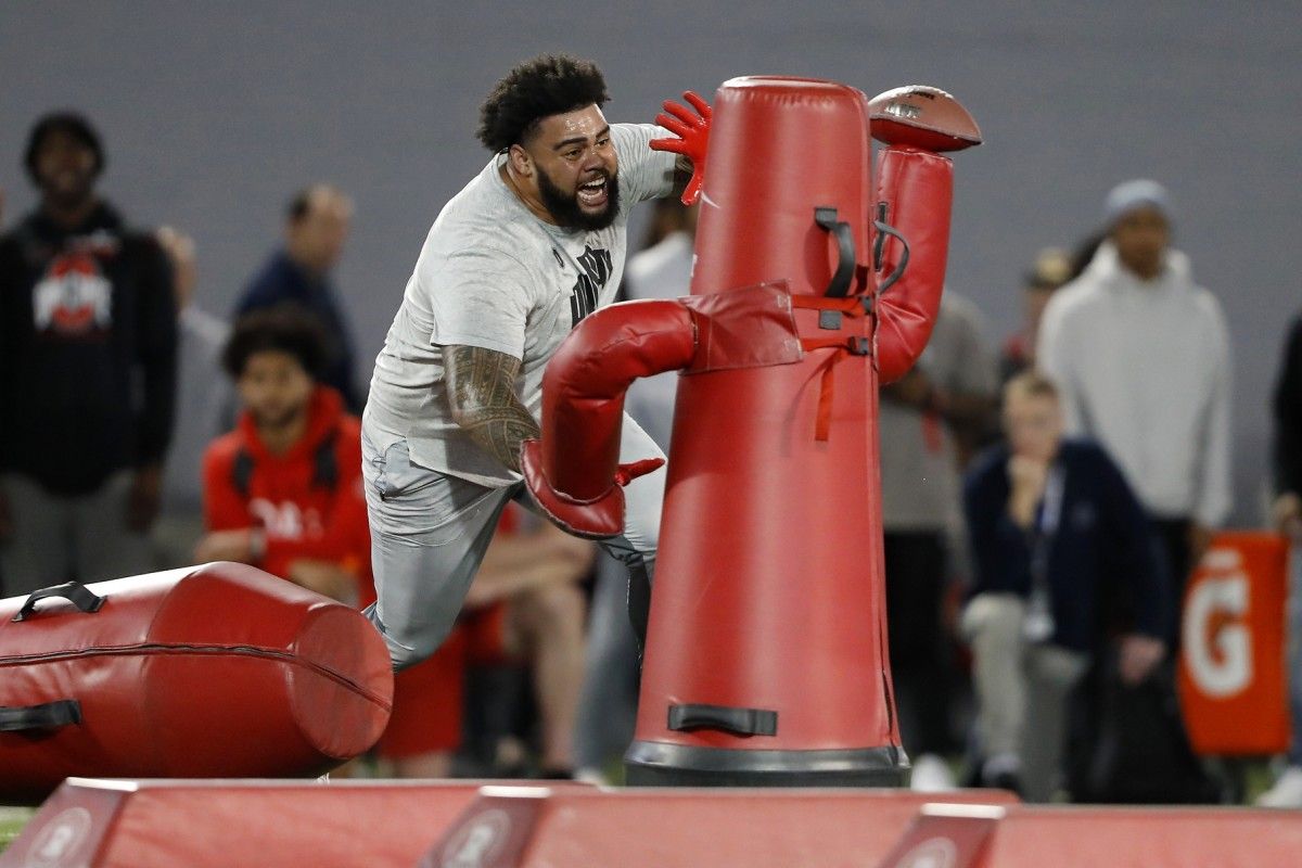 Ohio State Buckeyes defensive tackle Haskell Garrett runs the pass rush drill as part of the Pro Day at the Woody Hayes Facility.