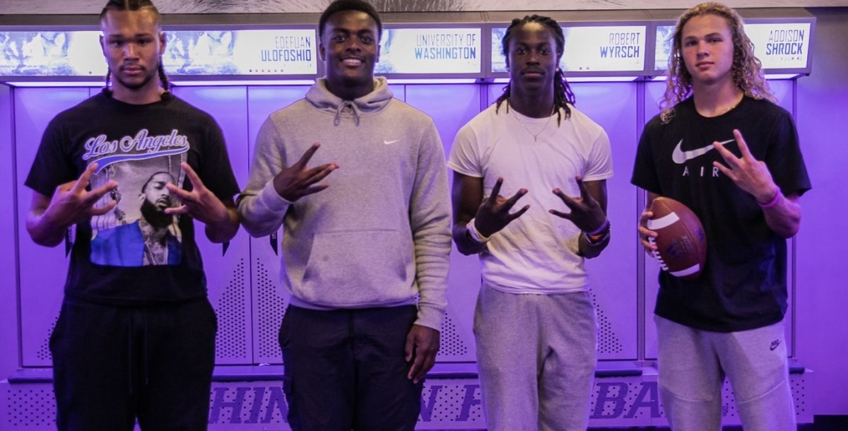 Avery Johnson, at right, took a UW visit.