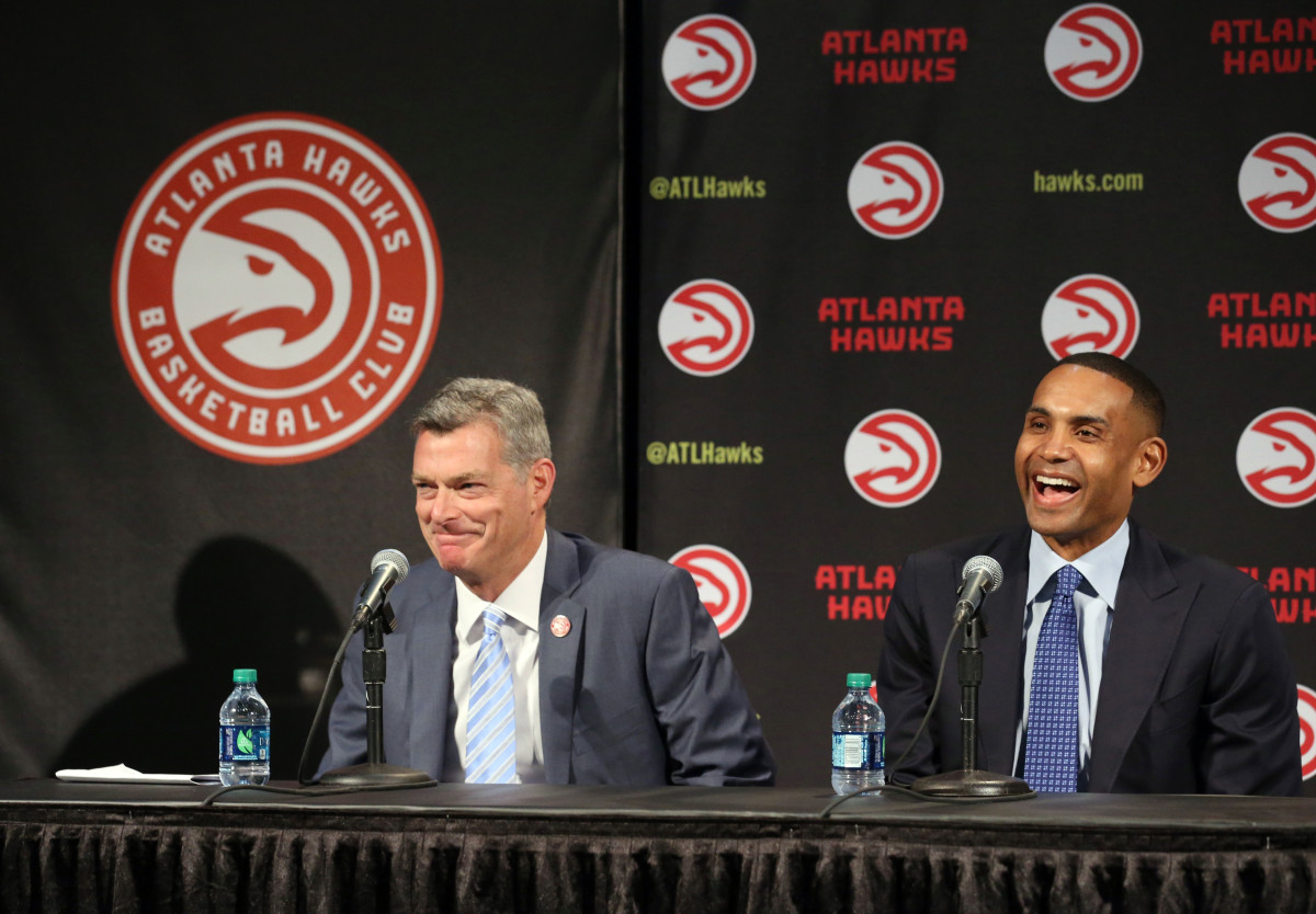 Atlanta Hawks owner Tony Ressler (left) and Atlanta Hawks owner Grant Hill speak during a press conference at Philips Arena. The Atlanta Hawks officially announced today that it was purchased by an ownership group led by Tony Ressler.
