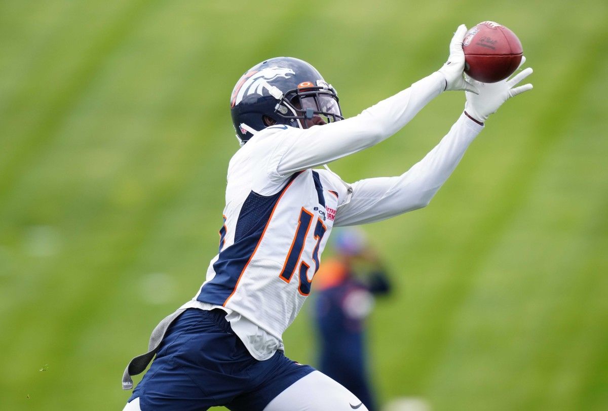 Denver Broncos cornerback Michael Ojemudia (13) during OTA workouts at the UC Health Training Center.