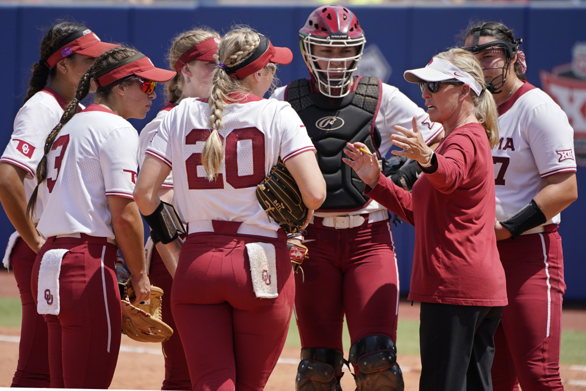Oklahoma softball coach Patty Gasso talks to her team
