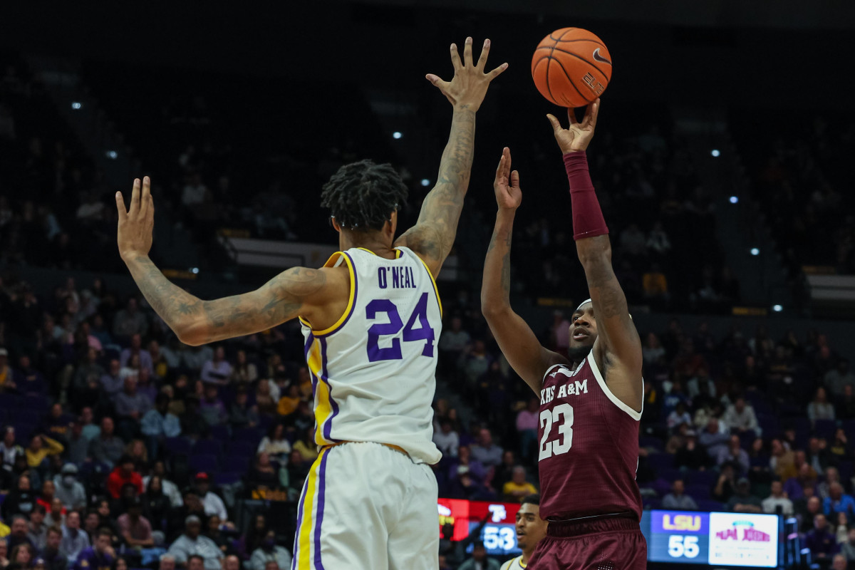 Shareef O'Neal goes up to block a shot against Texas A&M in the Pete Maravich Assembly Center, showing off his tremendous length. 