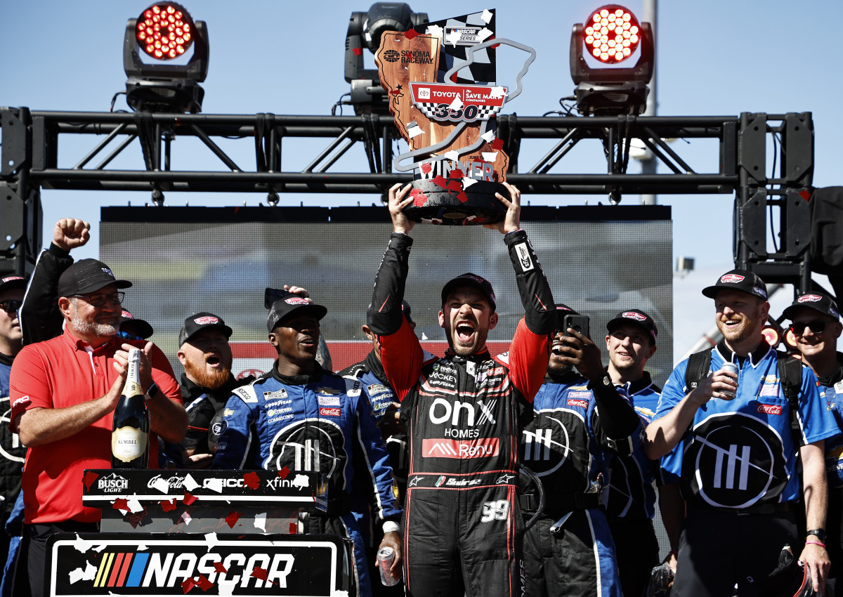 Daniel Suarez celebrates in victory lane after winning the 2022 Toyota/Save Mart 350 at Sonoma Raceway. (Photo by Chris Graythen/Getty Images)