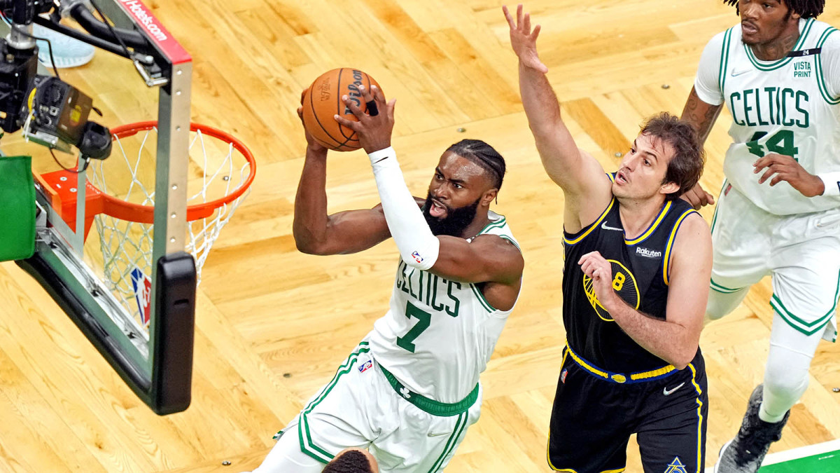 Boston Celtics guard Jaylen Brown (7) shoots the ball against Golden State Warriors forward Nemanja Bjelica (8) during the fourth quarter during game four of the 2022 NBA Finals.