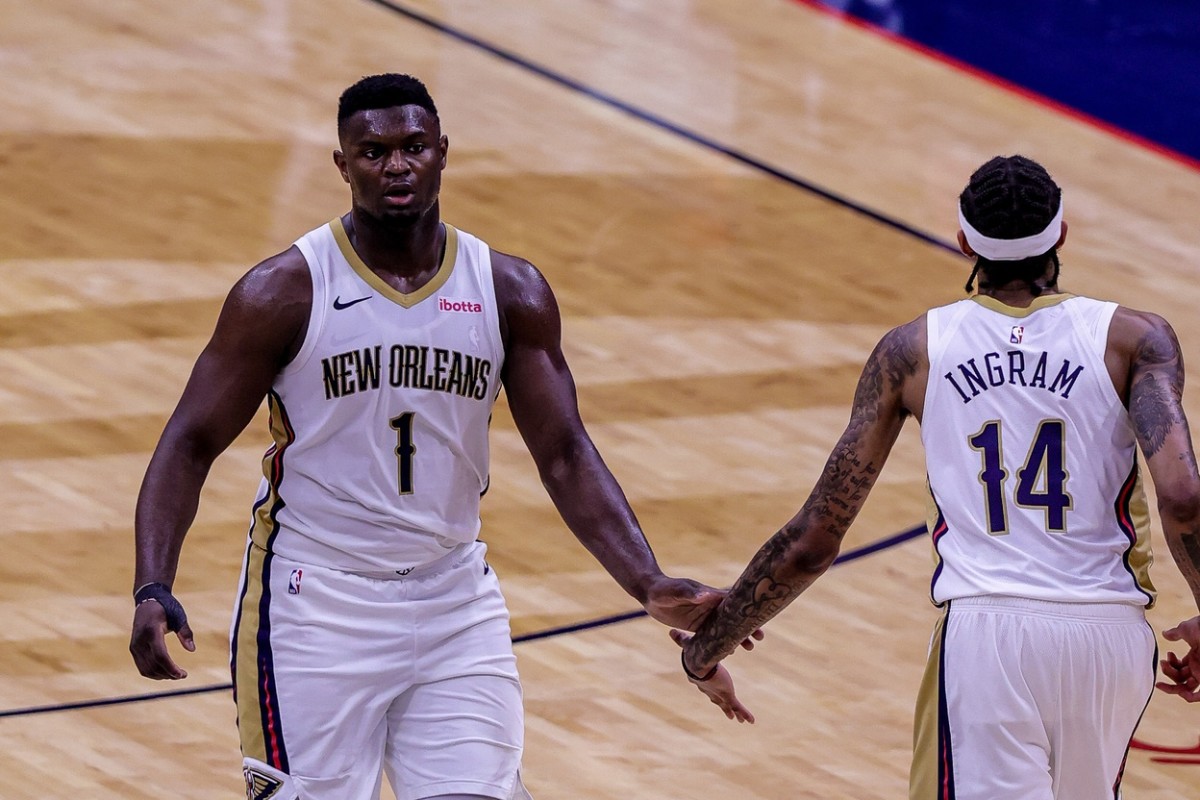 Apr 26, 2021; New Orleans, Louisiana, USA; New Orleans Pelicans forward Zion Williamson (1) is congratulated by forward Brandon Ingram (14) after making a three-point basket against LA Clippers during the second half at the Smoothie King Center. Mandatory Credit: Stephen Lew-USA TODAY Sports