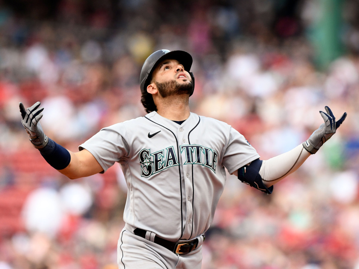 May 22, 2022; Boston, Massachusetts, USA; Seattle Mariners third baseman Eugenio Suarez (28) reacts after hitting a solo home run against the Boston Red Sox during the ninth inning at Fenway Park.
