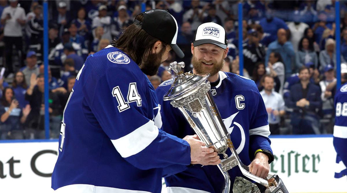 Jun 11, 2022; Tampa, Florida, USA; Tampa Bay Lightning center Steven Stamkos (91) celebrates with left wing Pat Maroon (14) as he holds the Prince of Wales Trophy after defeating the New York Rangers in game six of the Eastern Conference Final of the 2022 Stanley Cup Playoffs at Amalie Arena.