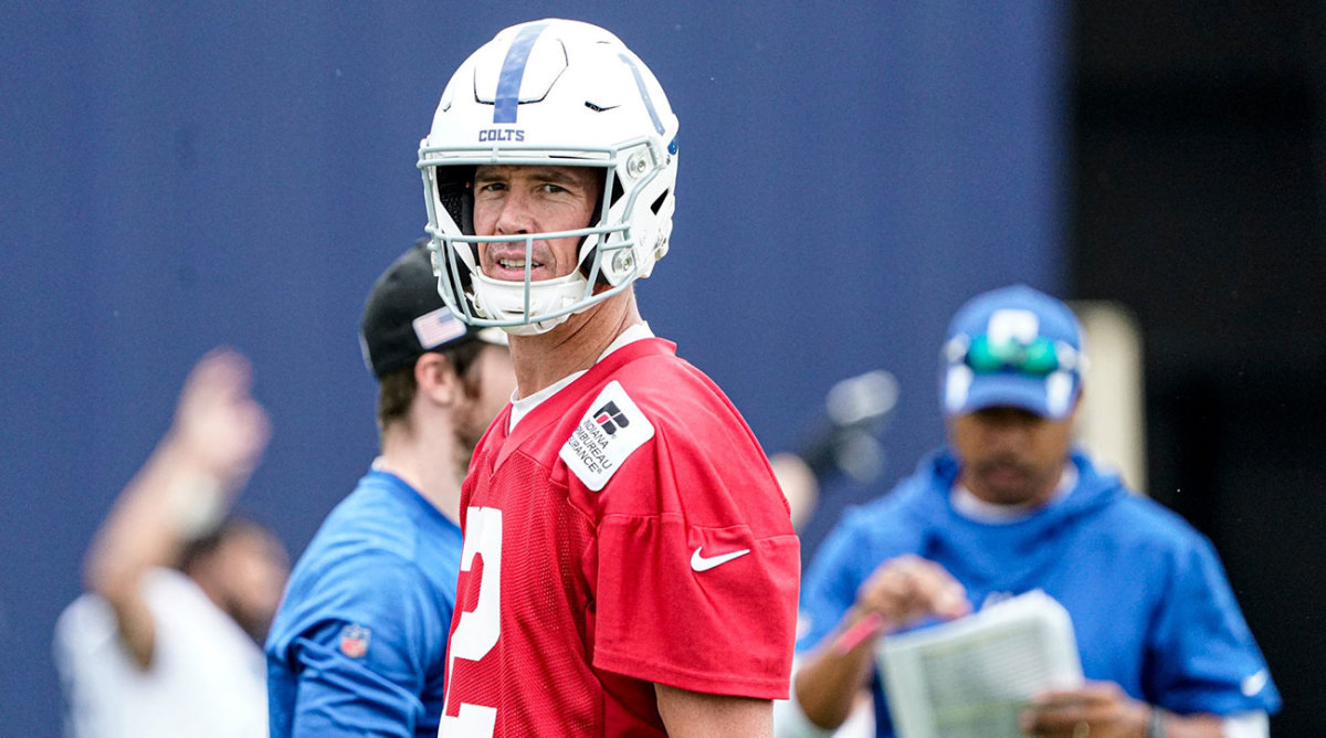 Matt Ryan wearing a red Colts practice jersey.